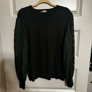Elegant Black Sweater with Textured Sleeves